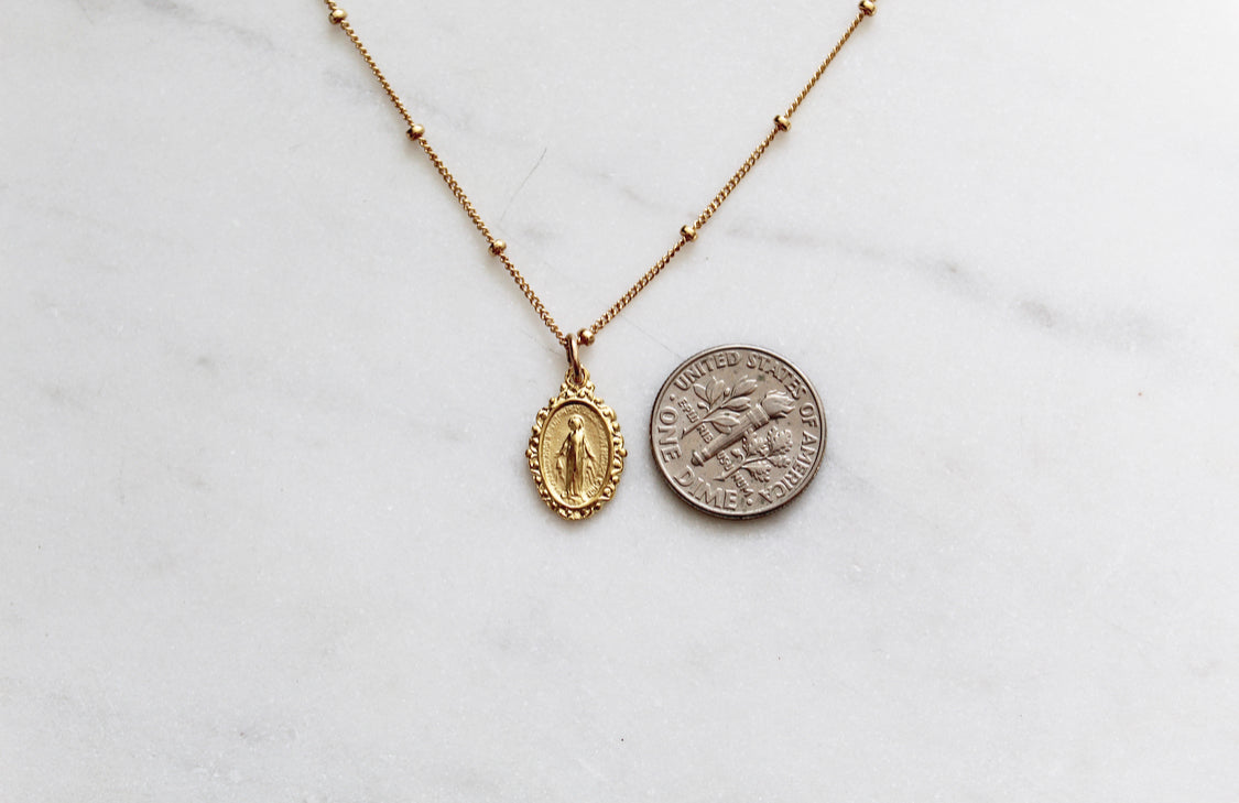 Intricate Miraculous medal necklace