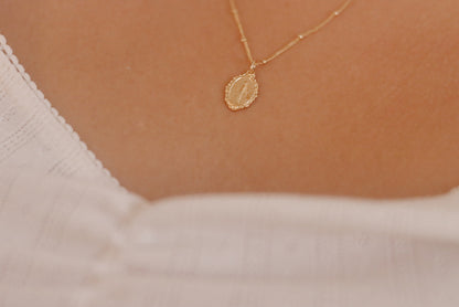 Intricate Miraculous medal necklace