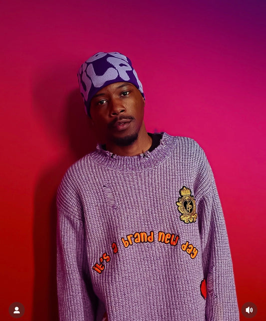 RODRI Heavy Gauge Ripped Knit Sweater with patches