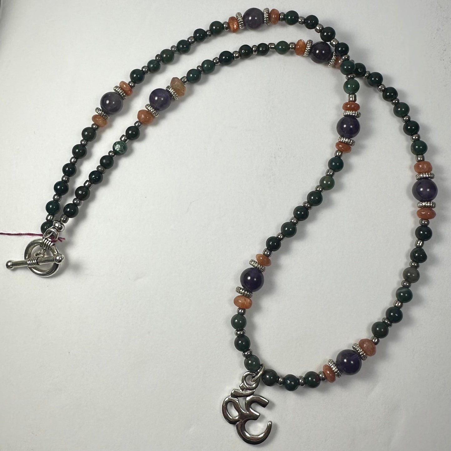 Handmade Bead Necklace with Silver 'Om' Pendant