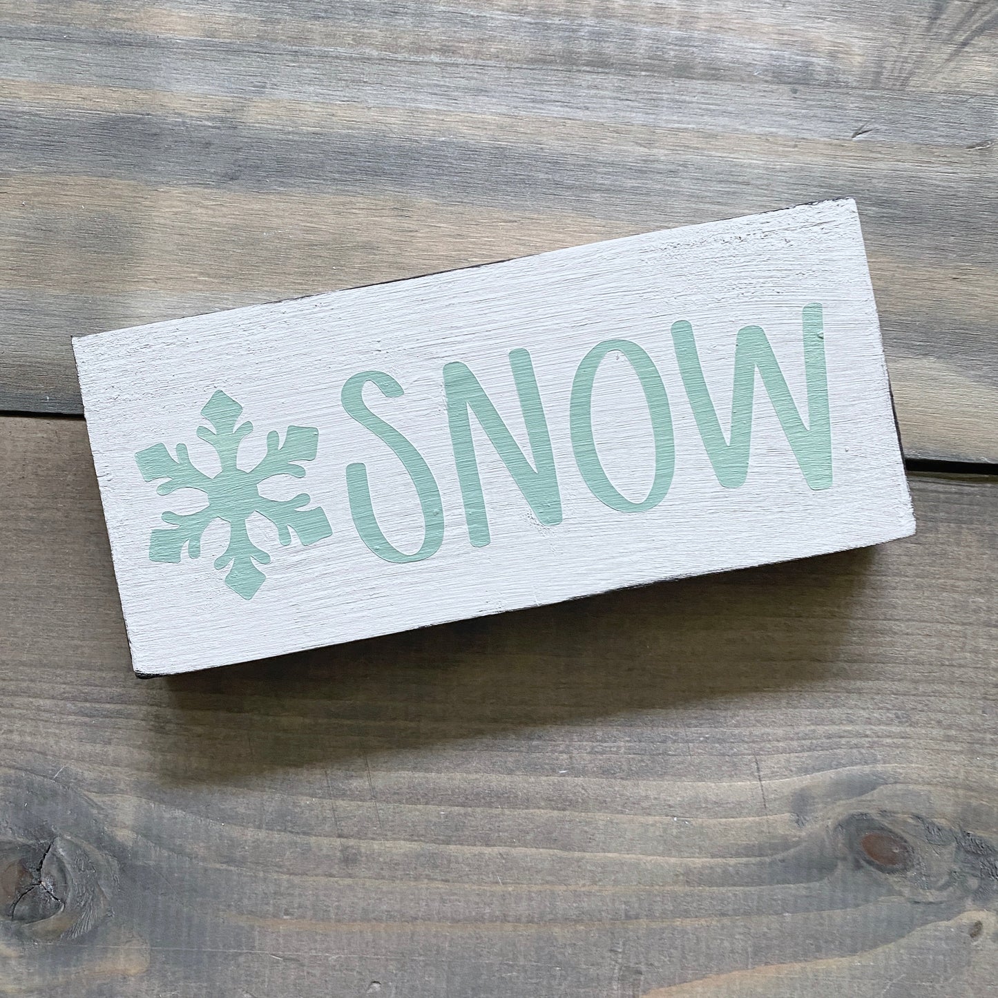 Snow with Snowflake Sign