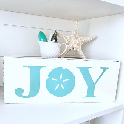 Joy Sand Dollar Sign
