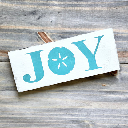 Joy Sand Dollar Sign