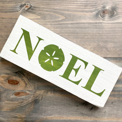 Noel Sand Dollar Sign