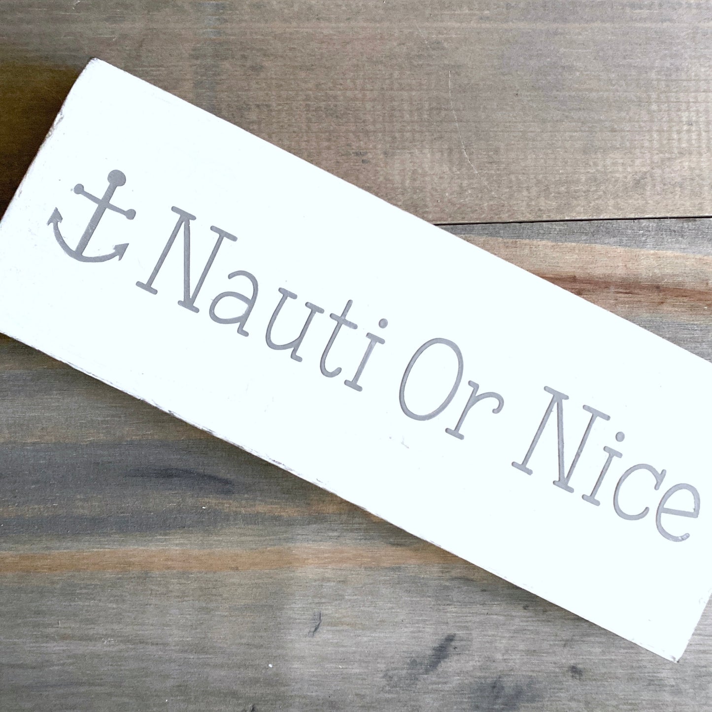 Nauti or Nice anchor sign