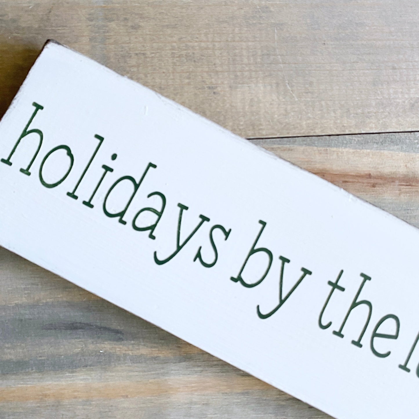 Holidays by the lake sign