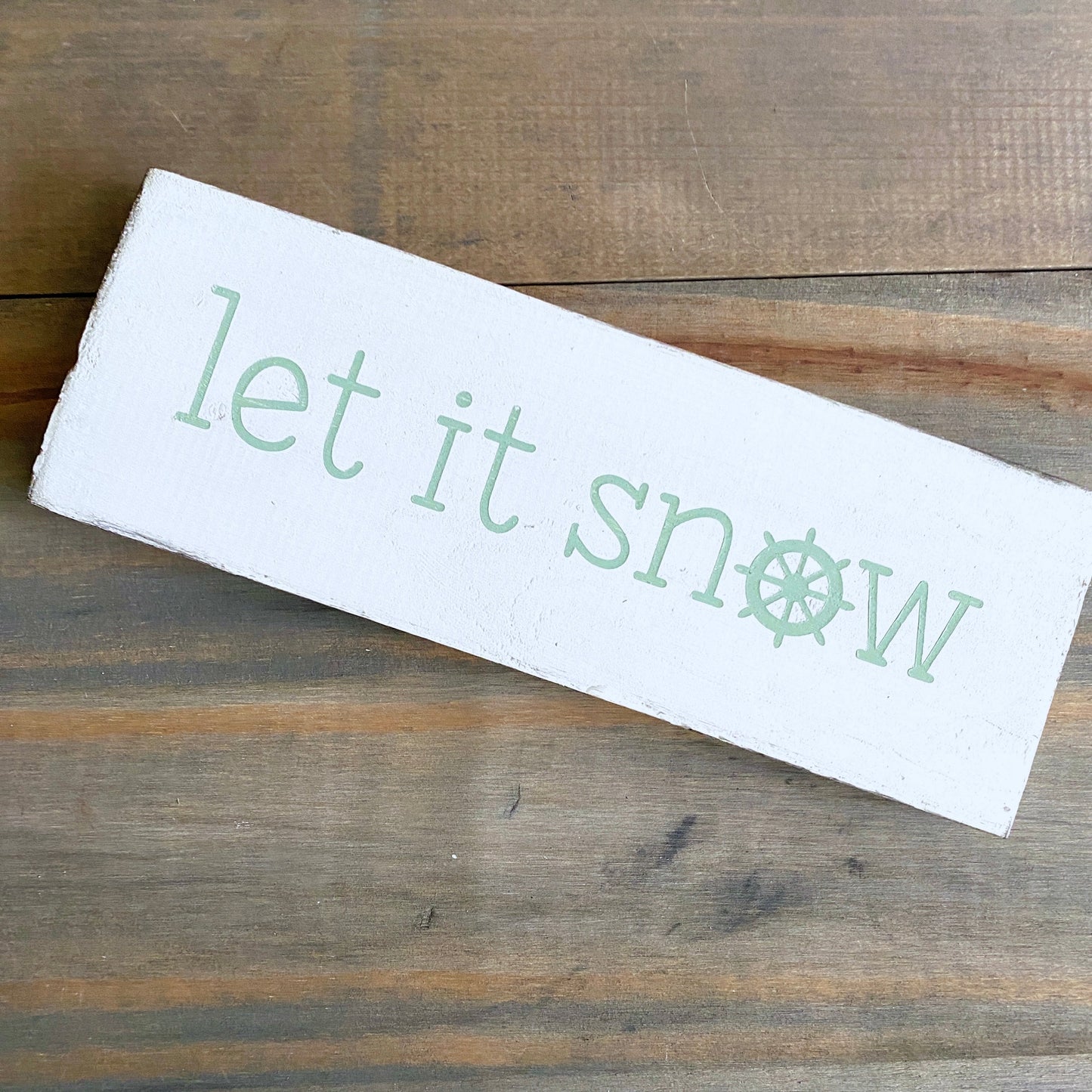 Let it snow ship wheel sign