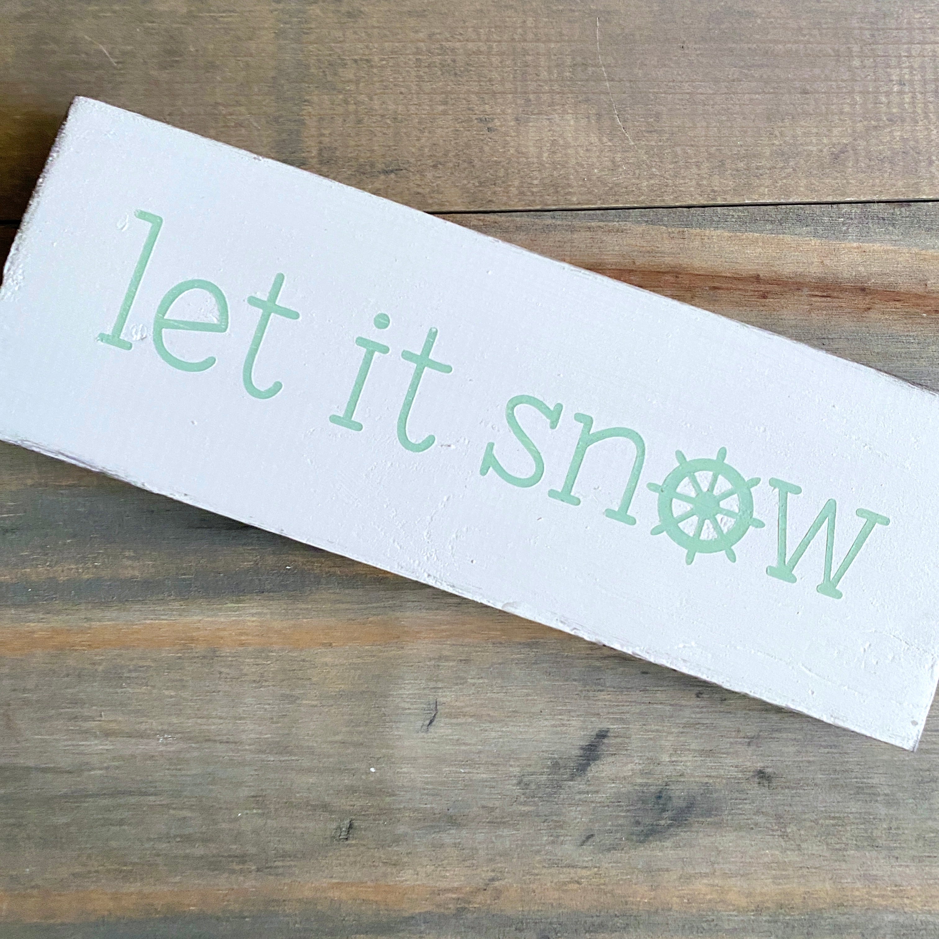 Let it snow ship wheel sign