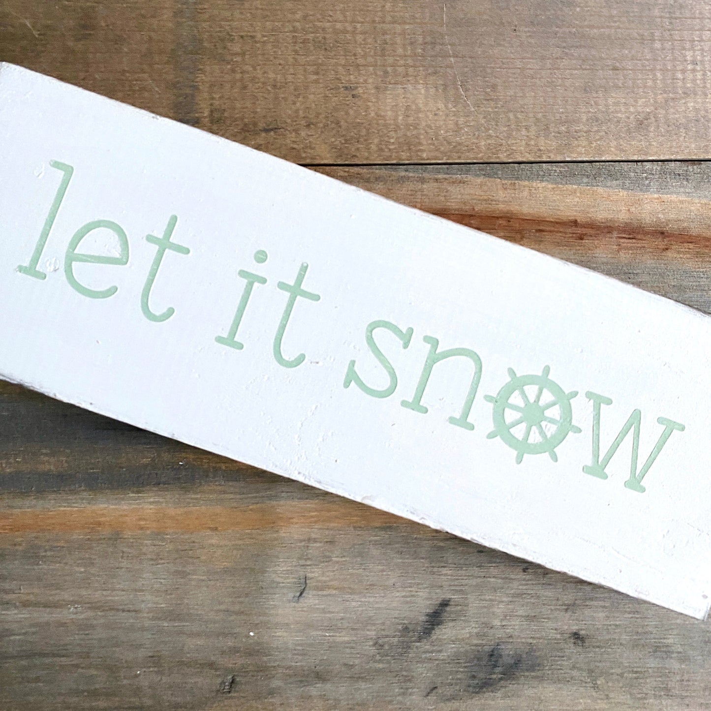 Let it snow ship wheel sign