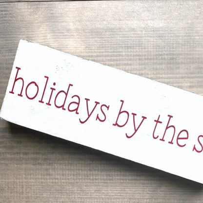 Holidays by the sea sign