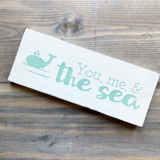 You, me, and the sea sign