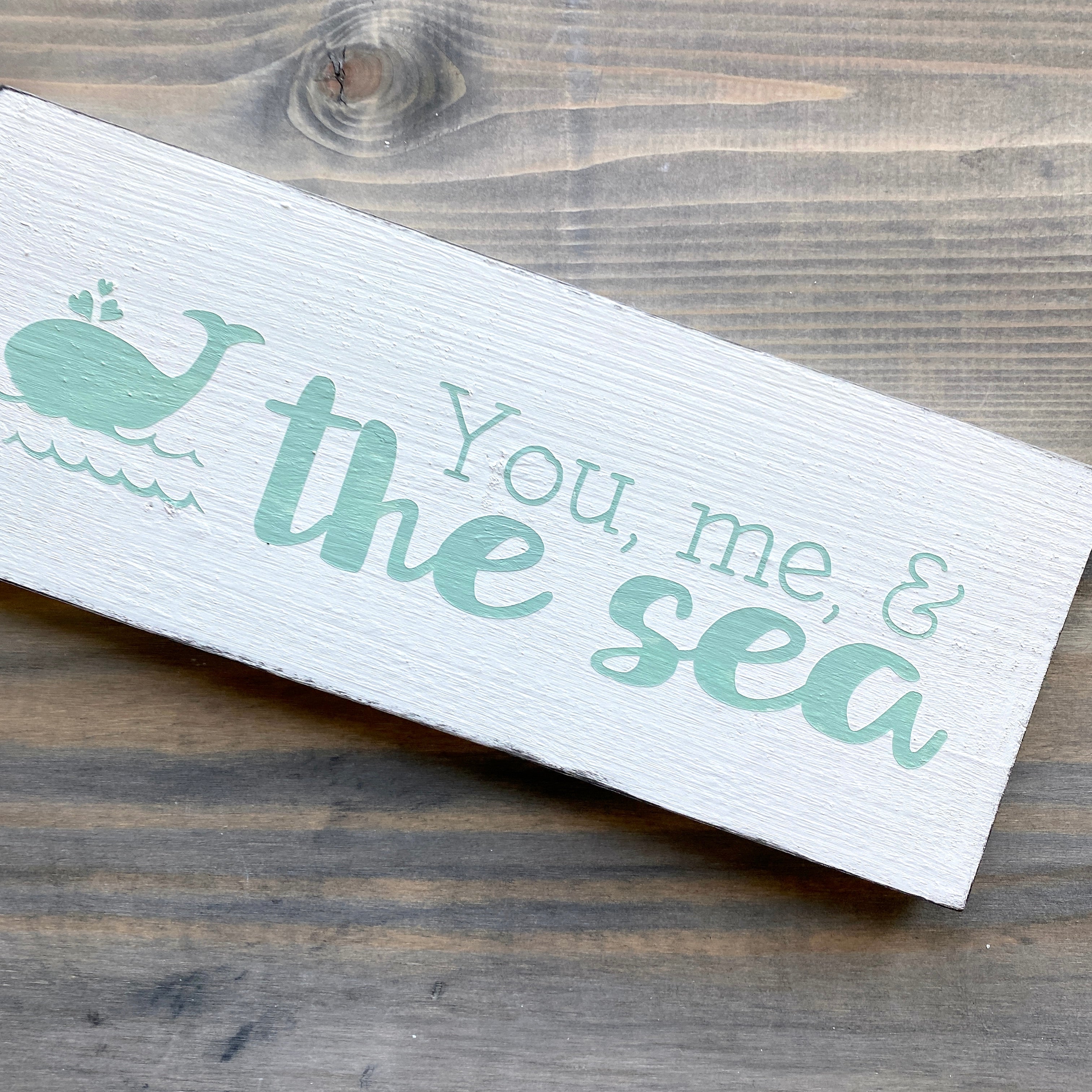 You, me, and the sea sign