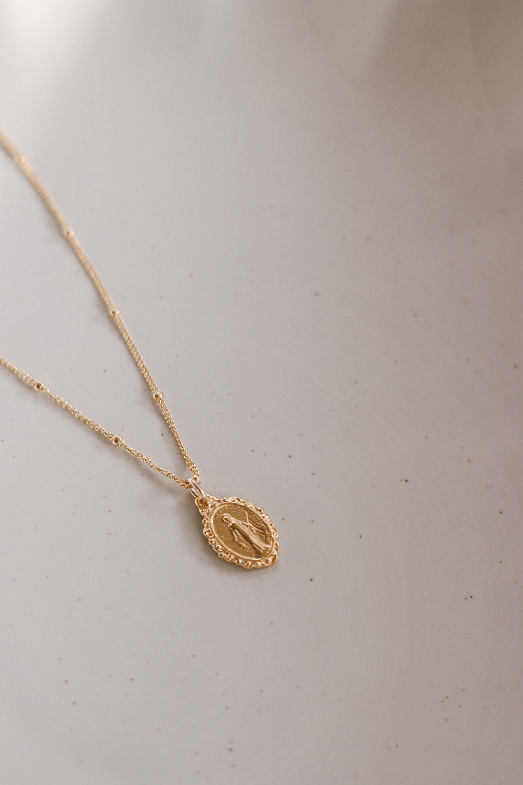 Intricate Miraculous medal necklace