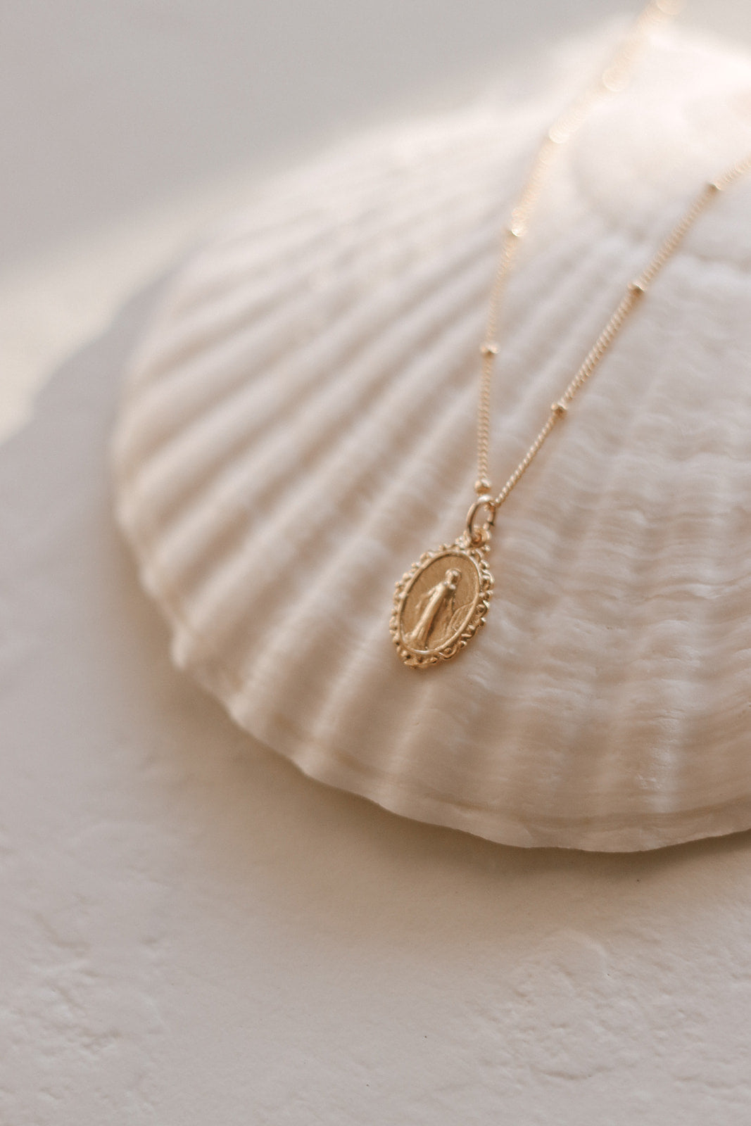 Intricate Miraculous medal necklace