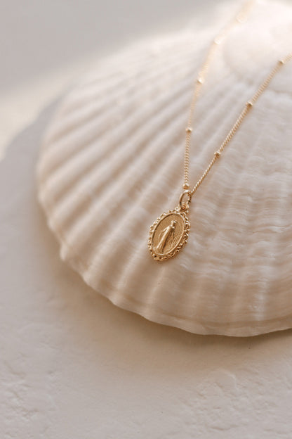 Intricate Miraculous medal necklace