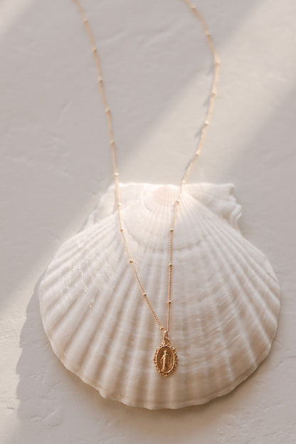 Intricate Miraculous medal necklace