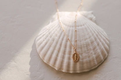 Intricate Miraculous medal necklace